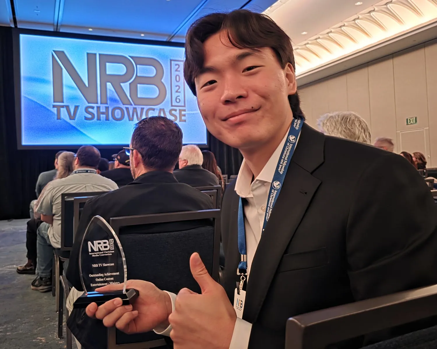 Producer David Chung holding the NRB 2026 TV Showcase award